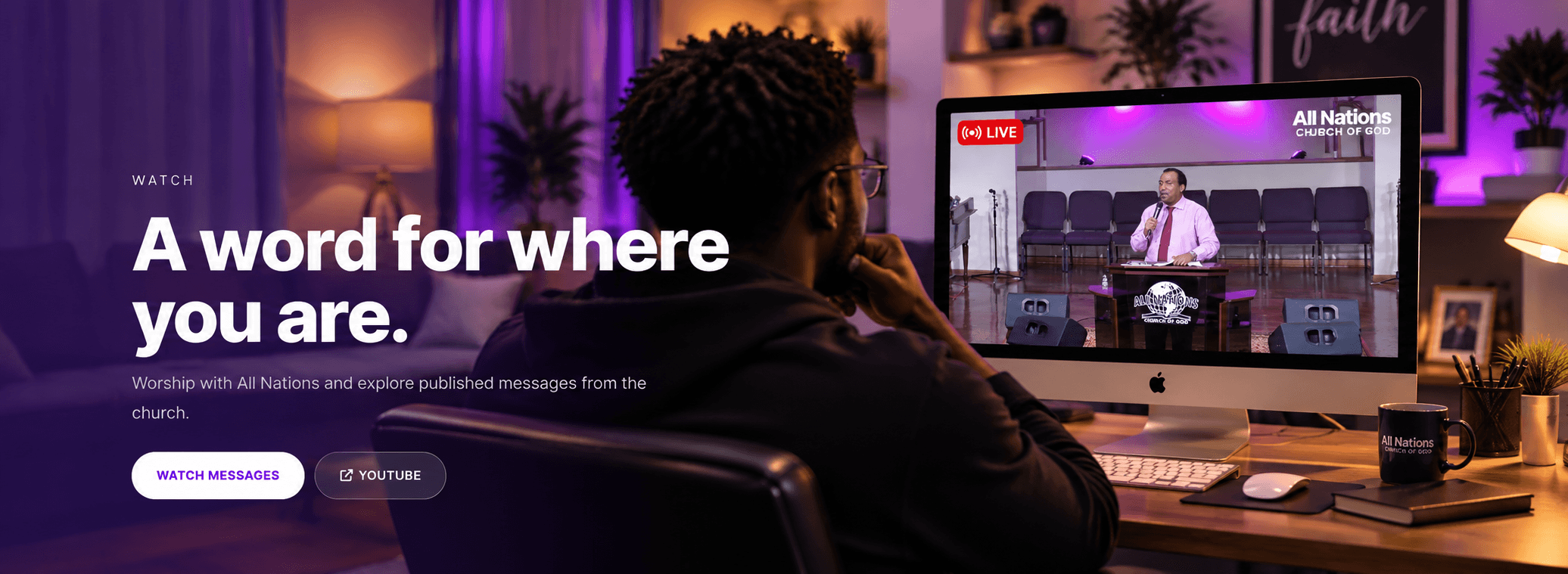 A person watching Pastor Emmanuel Simmons preach during an All Nations Church livestream on an iMac